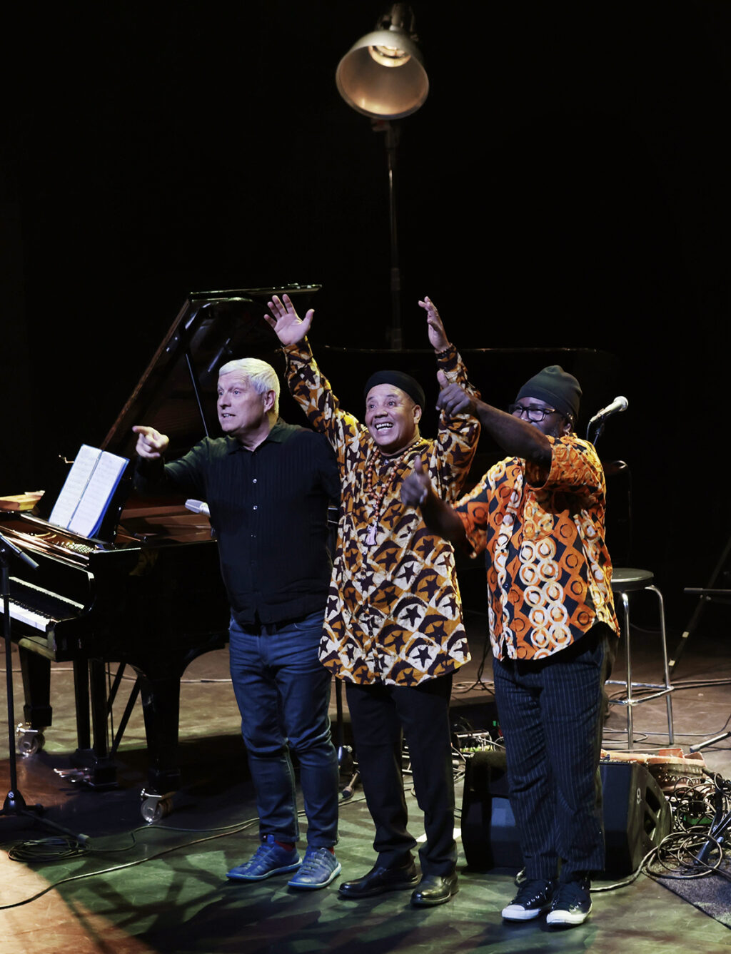 Trio Raulin, Bekkas, Biayenda is performing on the stage.