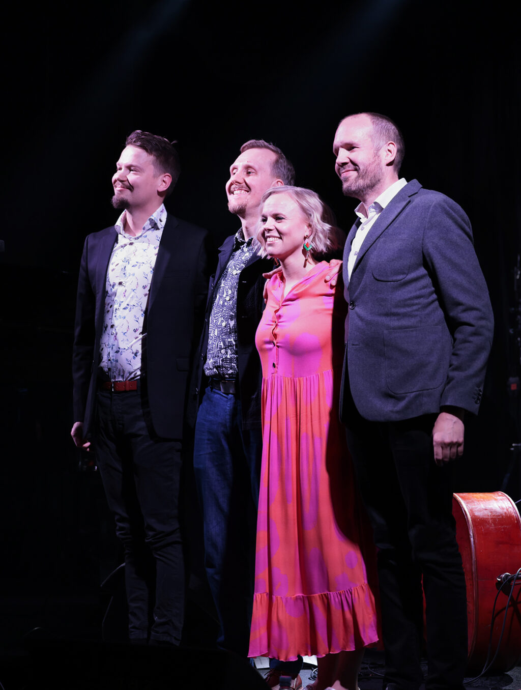 Aili Ikonen and the award presenters on stage.