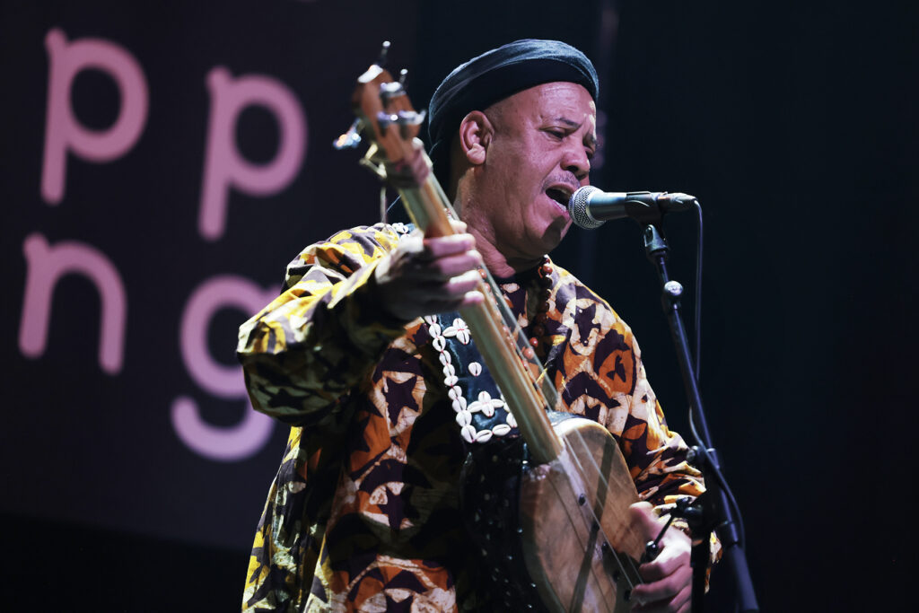 Trio Raulin, Bekkas, Biayenda is performing on the stage.