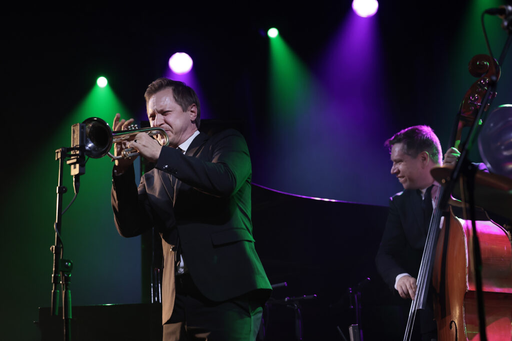 The Five Corners Quintet is performing on the stage.