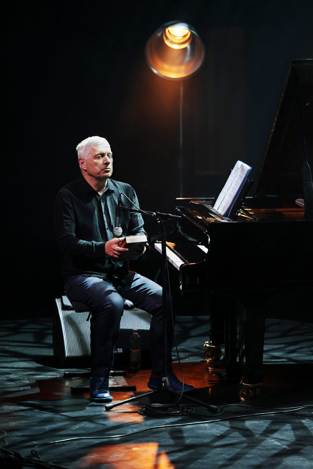 Trio Raulin, Bekkas, Biayenda is performing on the stage.