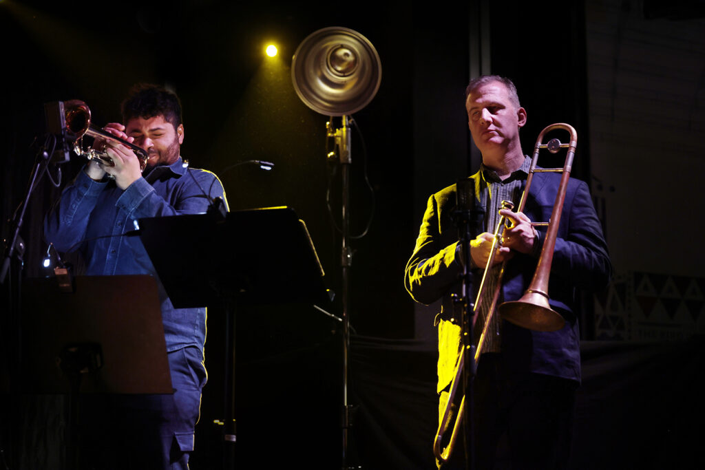 Mary Halvorson Amaryllis Sextet is performing on the stage.