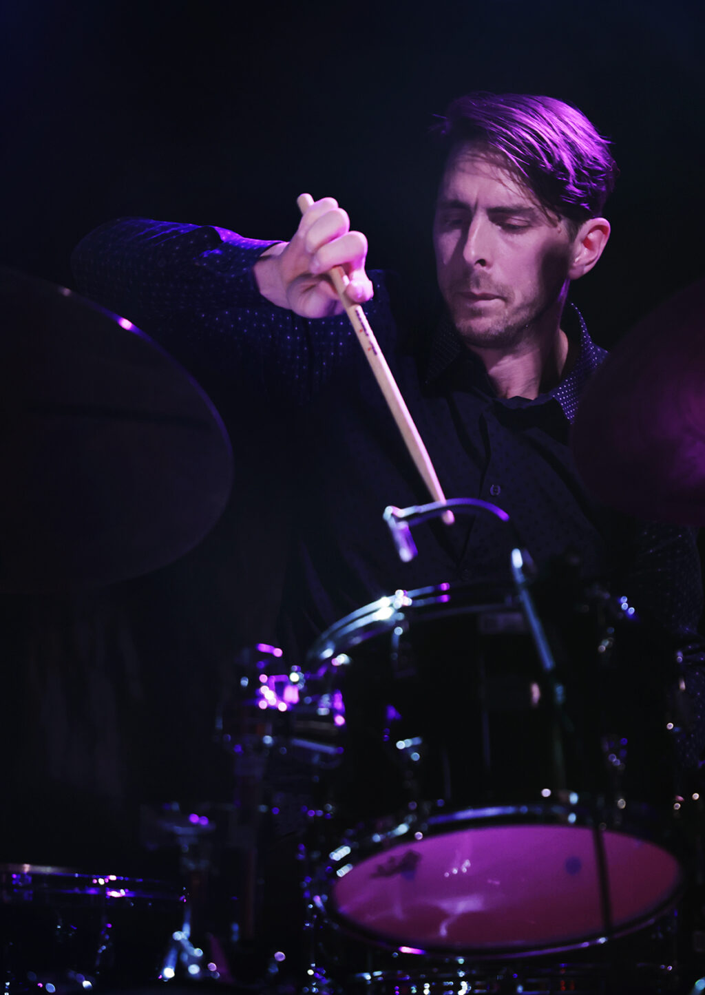 Jim Hart is playing the drums.