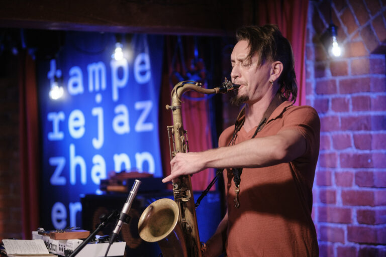 Pauli Lyytinen is performing on the stage.