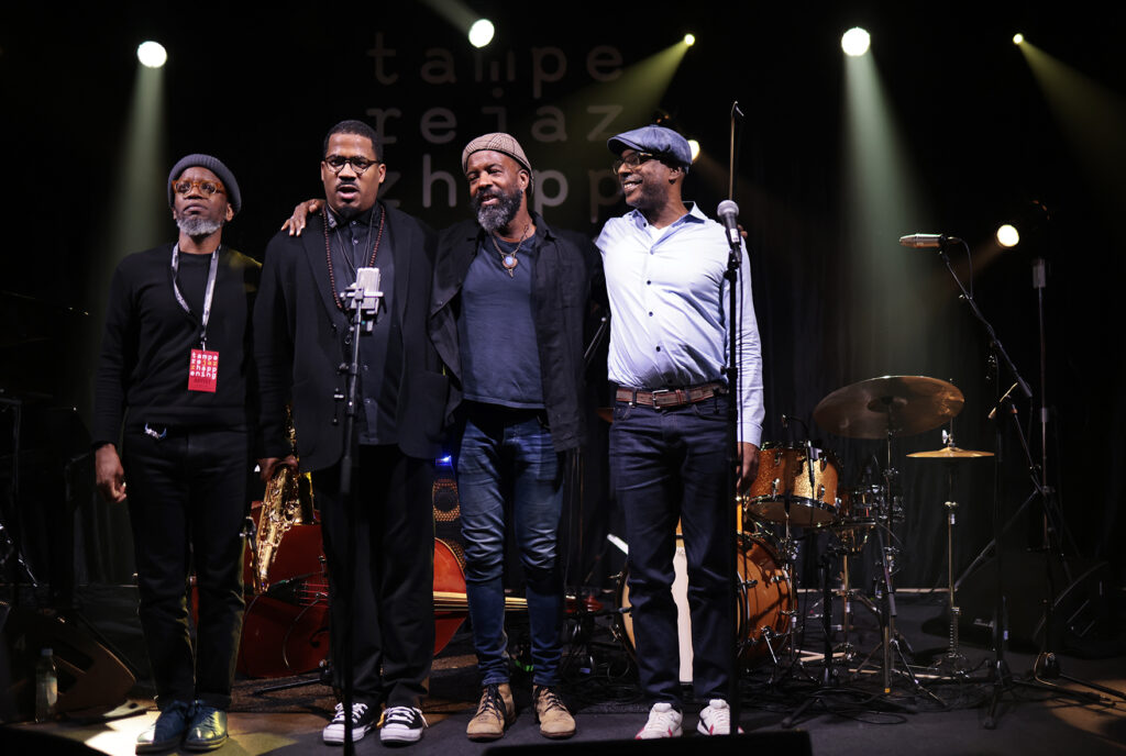 James Brandon Lewis Quartet is performing on the stage.