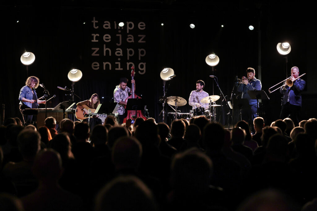 Mary Halvorson Amaryllis Sextet is performing on the stage.