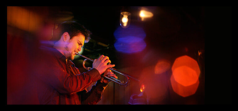 Verneri Pohjola is playing the trumpet.