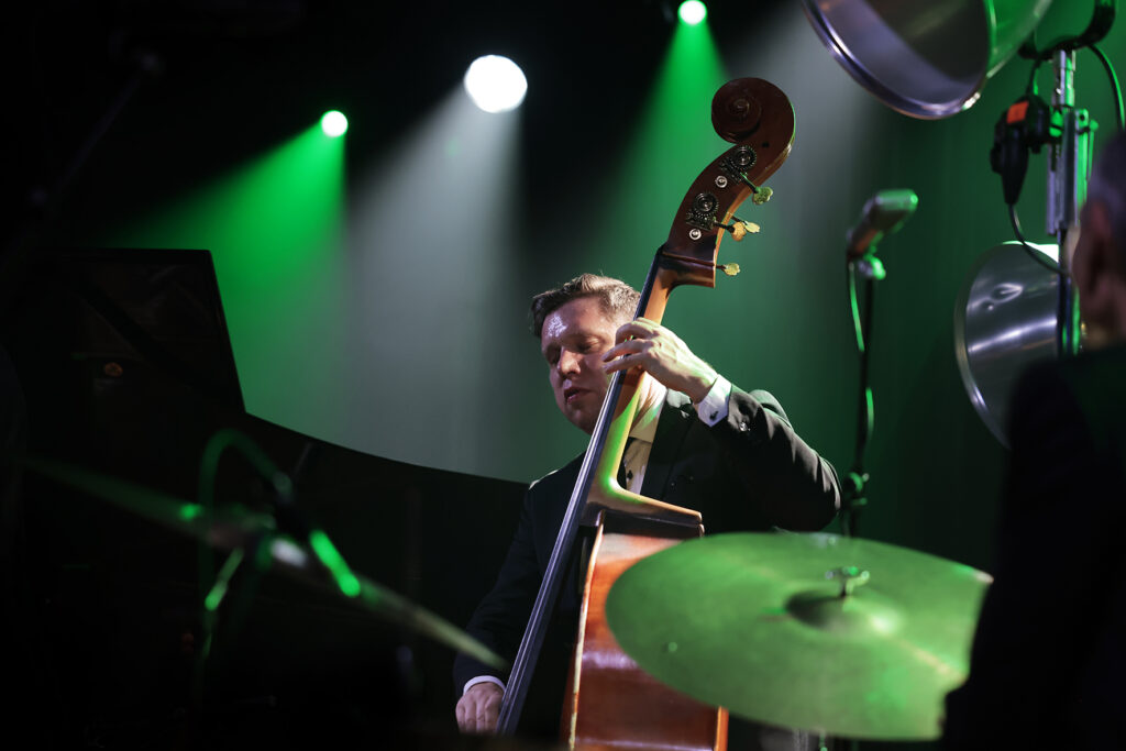 The Five Corners Quintet is performing on the stage.