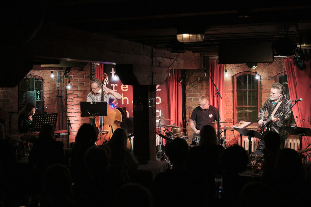 Iro Haarla Ouranos Ensemble is performing on the stage.