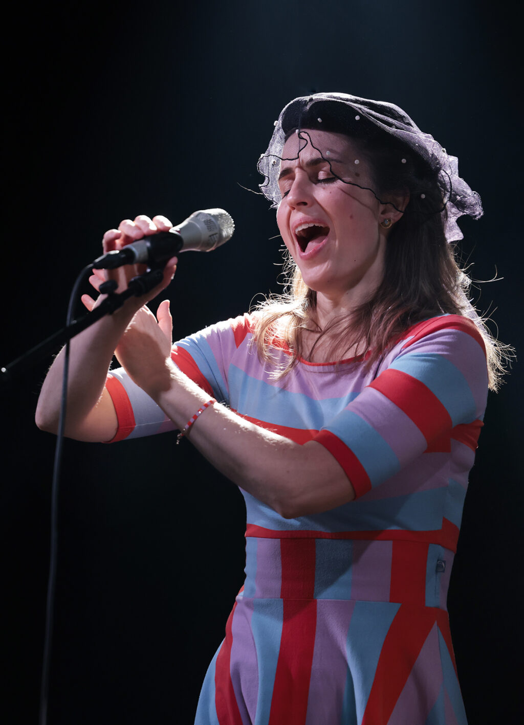 How Noisy Are The Rooms? is performing on the stage.