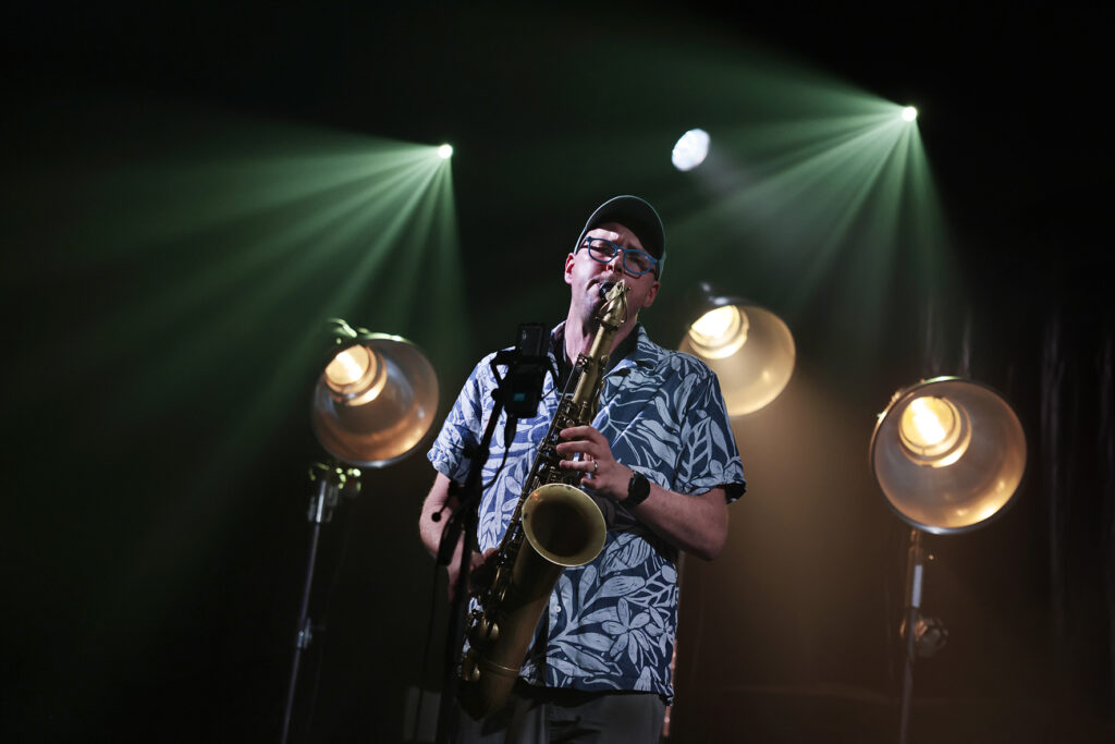 Joe Wright is playing the sax.