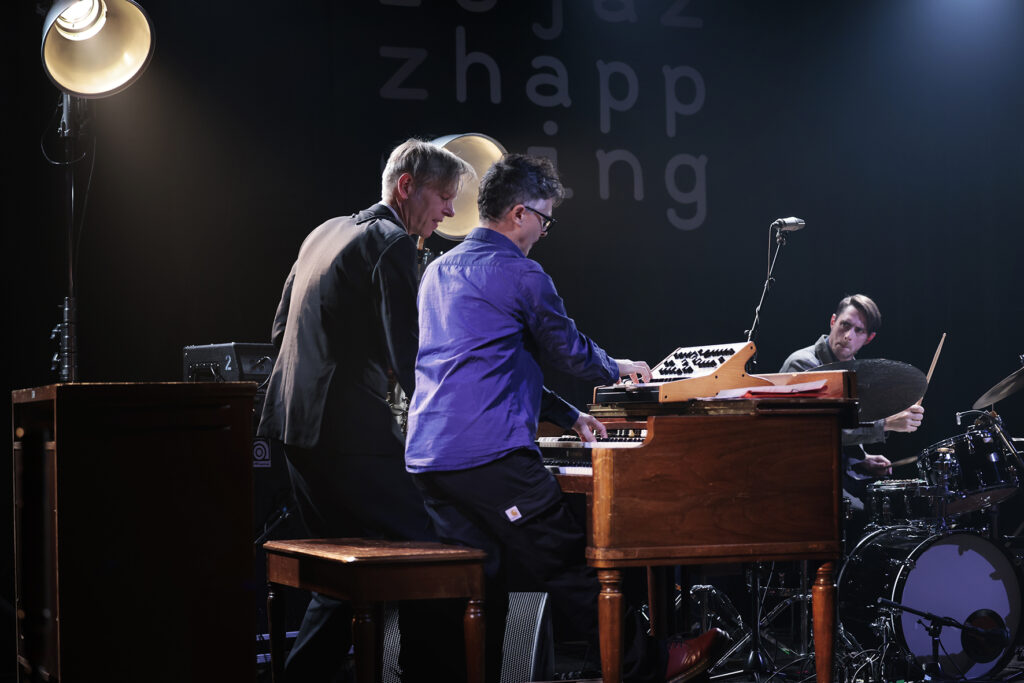 Daniel Erdmann's Organic Soulfood is performing on the stage.