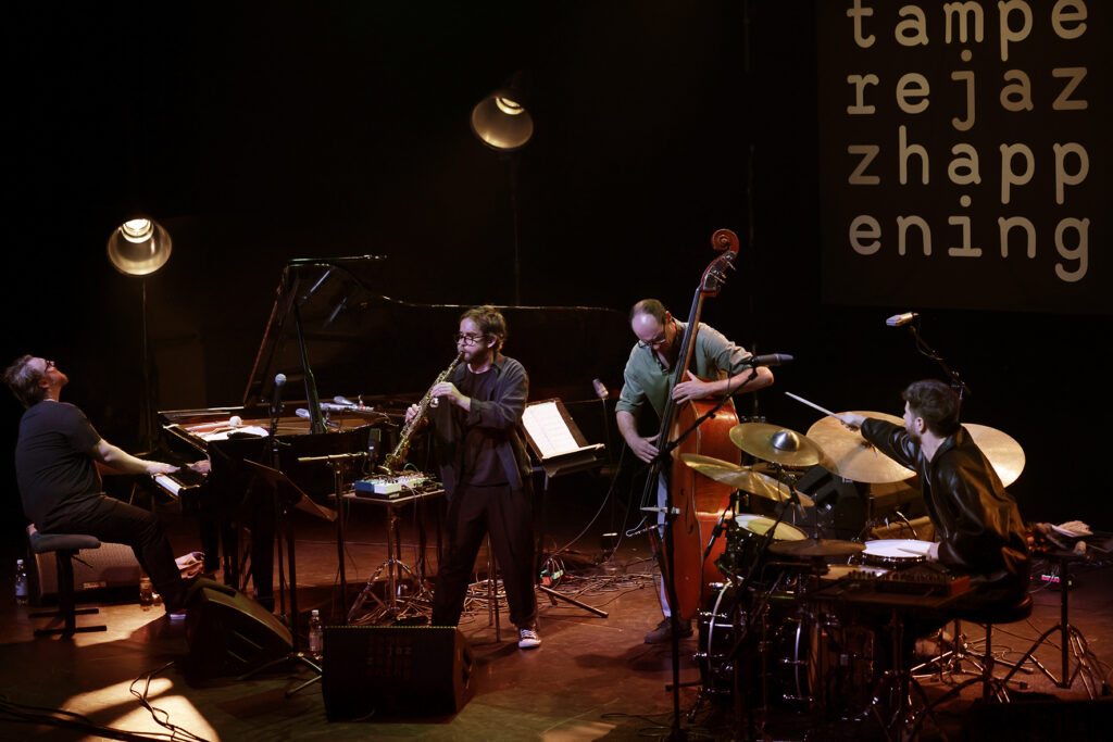 Émile Parisien Quartet is performing on the stage.