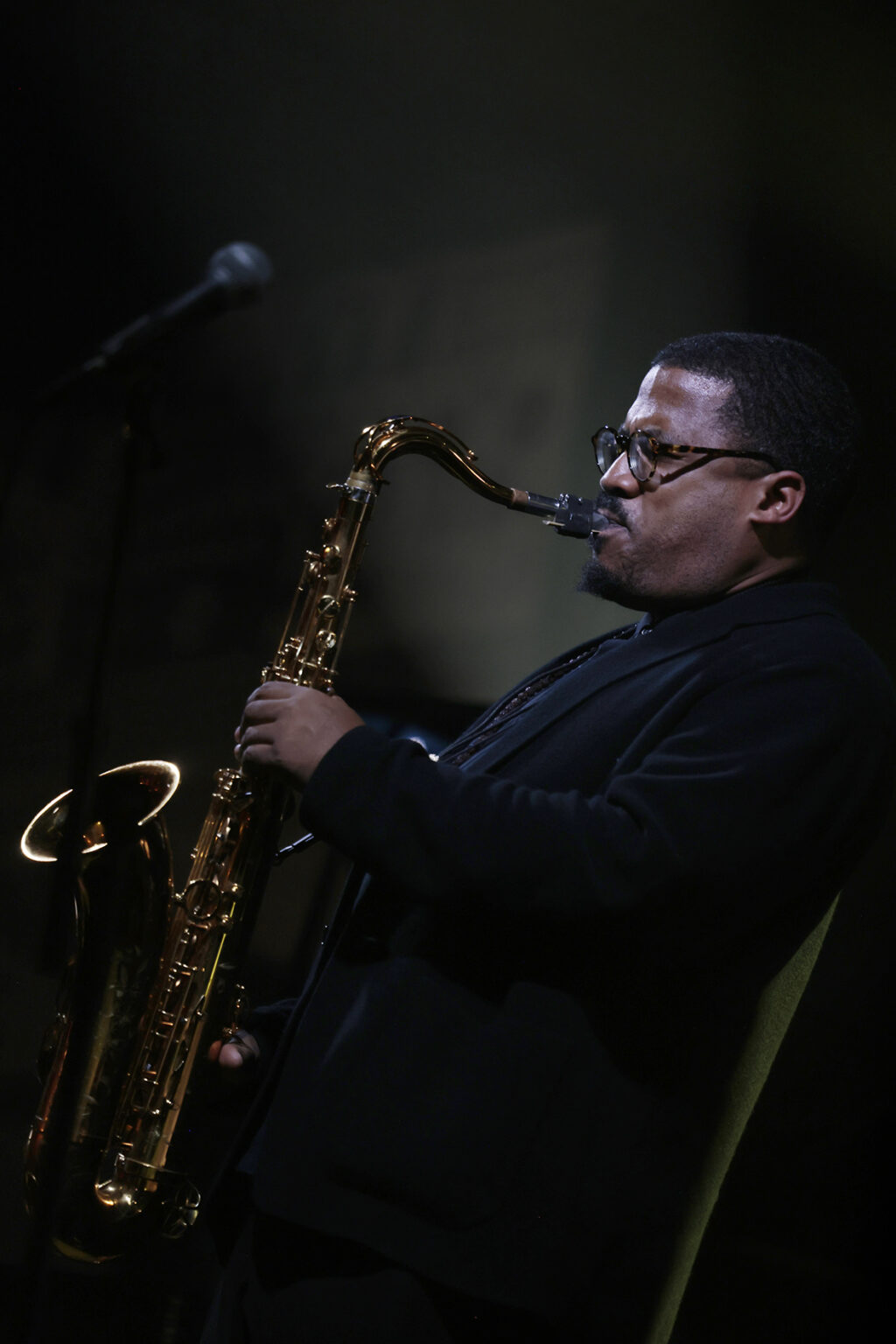 James Brandon Lewis Quartet is performing on the stage.