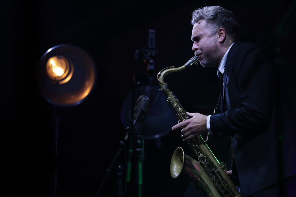 The Five Corners Quintet is performing on the stage.