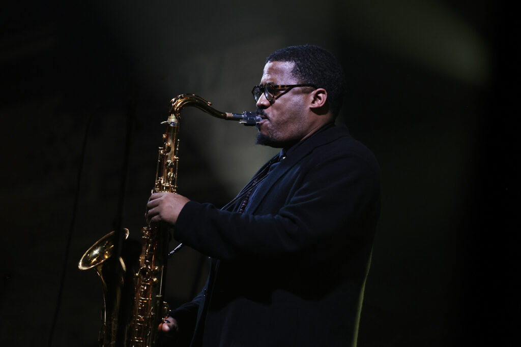 James Brandon Lewis Quartet is performing on the stage.