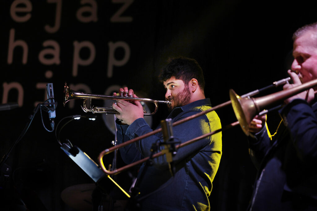 Mary Halvorson Amaryllis Sextet is performing on the stage.